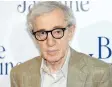  ??  ?? Dylan Farrow, right, daughter of Woody Allen, middle, and Mia Farrow ( all three pictured far left). In a recorded interview Thursday on CBS This Morning, Farrow recounted an alleged 1992 incident, in which she says Allen molested her as a child. The...