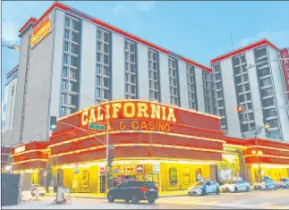  ?? Las Vegas Review-journal ?? California Hotel, operated by Boyd Gaming Corp., is seen in March. Boyd plans to reopen properties with limited amenities and capacity restrictio­ns, according to a Monday news release.