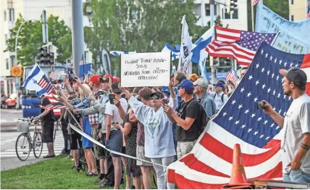  ??  ?? People gather to welcome President Donald Trump and first lady Melania Trump to Helsinki on Sunday.