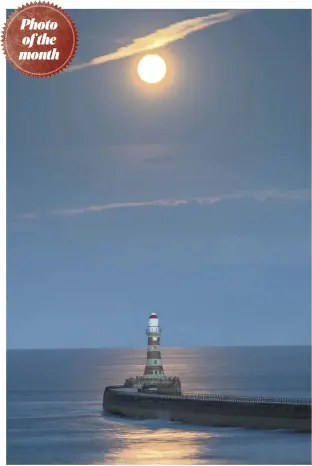  ??  ?? ALL LIT UP By: Simon Woodley Where: Roker Bay, Sunderland “Taken on an August evening, this full moon is rising over Roker Pier and lighthouse.”