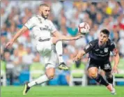  ?? AFP ?? Karim Benzema (L) in action against Leganes on Saturday.