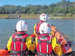  ??  ?? RNLI lifeboat crews were called out three times in two hours on Saturday as people headed to the beach.