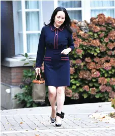  ?? — AFP photo ?? Meng Wanzhou, leaves her Vancouver home to appear in British Columbia Supreme Court, in Vancouver,British Columbia.