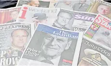  ?? — AFP photo ?? A spread showing the front pages of British newspapers reporting on the death of Prince Philip is pictured in Brighton, south England.