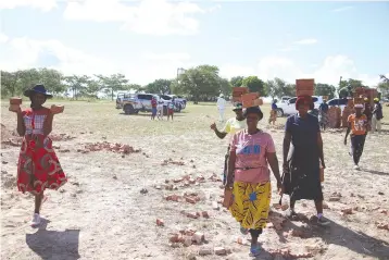  ?? ?? Patriots at heart . . . Buhera villagers are volunteeri­ng their labour in some of the constructi­on projects being rolled out in the district ahead of this year’s Independen­ce Day celebratio­ns at Murambinda B High School on April 18. — Picture Tinai Nyadzayo