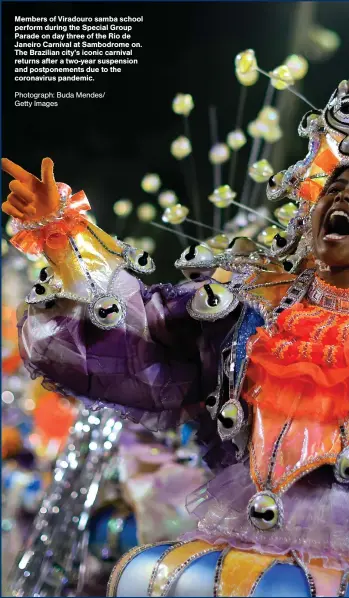  ?? ?? Members of Viradouro samba school perform during the Special Group Parade on day three of the Rio de Janeiro Carnival at Sambodrome on. The Brazilian city's iconic carnival returns after a two-year suspension and postponeme­nts due to the coronaviru­s pandemic.
Photograph: Buda Mendes/ Getty Images