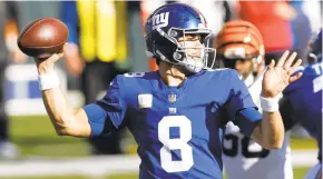  ?? AARONDOSTE­R/APFILE PHOTO ?? Giants quarterbac­k Daniel Jones injured his hamstring last week against the Bengals and is questionab­le for Sunday’s game at Seattle. If Jones can’t play, Colt McCoy would make his first start of the season.