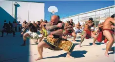  ?? COURTESY OF CHAPIN HALL ?? Inmates at the Saguaro Correction­al Center in Eloy, Ariz., perform a chant as a part of their protocol to celebrate makahiki, a period in the native Hawaiian lunar calendar when the focus is on peace and prosperity.