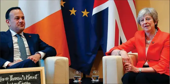  ??  ?? Dinner for two: Officially, Brexit is off the table as Leo Varadkar and Theresa May meet to discuss the Northern Executive… though we imagine there’s plenty to whet their appetite, left