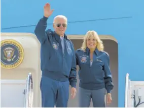  ?? (Photos: AP) ?? President Joe Biden waves as First Lady Jill Biden watches, standing at the top of the steps of Air Force One before boarding at Andrews Air Force Base on Saturday. To commemorat­e the US Air Force’s 75th anniversar­y, the Bidens are wearing Air Force One jackets. They left for London later in the day to attend the funeral of Queen Elizabeth II on Monday.