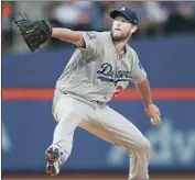  ?? Jim McIsaac Getty Images ?? CLAYTON KERSHAW goes after a New York Mets hitter in only his second outing since May 1.