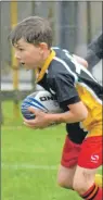  ??  ?? Arran Martin in action for Mid Argyll against Oban Lorne in the P4/5 section.