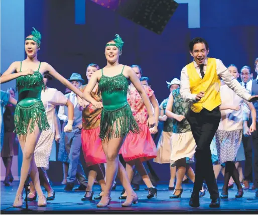 ??  ?? ON STAGE: Lily Darveniza, Rosie Kinnaird, Aunan Li and Imogen Gardiner rehearse Singin’ In The Rain at Cairns Performing