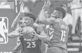  ?? YCL / Houston Chronicle ?? Guard Jimmy Butler, left, will have to be at the top of his game if Minnesota has any chance of upsetting Clint Capela and the top-seeded Rockets.