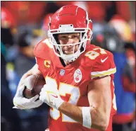  ?? Colin E. Braley / Associated Press ?? Kansas City Chiefs tight end Travis Kelce scores on a 48-yard touchdown reception during the first half of an AFC wildcard game against the Pittsburgh Steelers on Jan. 16.