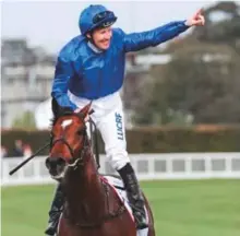  ?? Courtesy: Racing Photos ?? Jockey Pat Cosgrave celebrates aboard Godolphin’s Best Solution after winning the A$5million Caulfield Cup (G1) at Caulfield Racecourse in Australia yesterday.