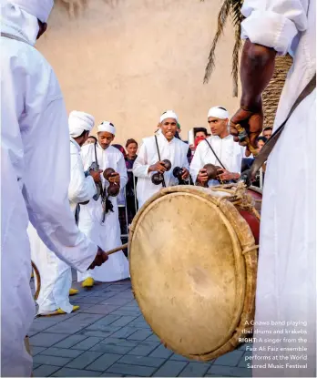  ?? ?? A Gnawa band playing tbel drums and krakebs
RIGHT: A singer from the Faiz Ali Faiz ensemble performs at the World Sacred Music Festival