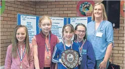  ?? Paul Smith. Pictures: ?? Top: Action from the swimathon; some of the swimmers taking part, middle; and, above, junior trophy winners Isla Webb, Joanne Lindsay, Alice Stewart and Rebecca Spasic with Jayne Grewar from Splash Community.