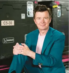  ?? CHARLES REX ARBOGAST/AP ?? Rick Astley, who is seen June 17 in Illinois, has joined the “Mixtape Tour 2022” of arenas this summer.