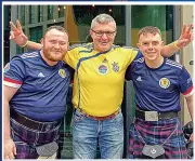  ?? ?? FRIENDLY Ukrainian and Scottish fans last night