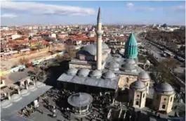  ??  ?? A picture in Konya, central Turkey shows the Mevlana Museum (left), the mausoleum of Mevlana Jalaluddin Rumi, the father of Sufism who lived in the 13th century.