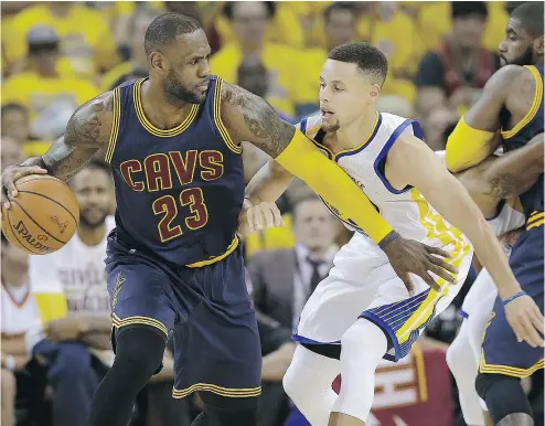  ?? MARCIO JOSE SANCHEZ / THE ASSOCIATED PRESS ?? Cleveland Cavaliers forward LeBron James, left, will face off against Golden State Warriors guard Stephen Curry in the NBA Final, the third-straight time the same two teams meet. That has never happened in league history.