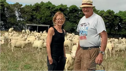  ??  ?? Cathy and Clarke with the ewes that helped them win awards at this year’s NZ Champions of Cheese Awards.