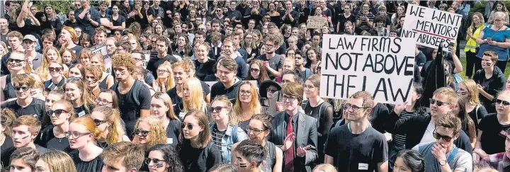  ?? Picture / Marty Melville ?? Victoria University students marched against sexual harassment in the legal fraternity yesterday. Victoria was one of six universiti­es to cut ties with Russell McVeagh.