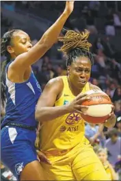  ?? Ringo H.W. Chiu Associated Press ?? THE SPARKS’ Chelsea Gray, who had 14 points, eight assists and six rebounds, drives to the basket.