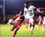  ?? ?? TUSSLE: Boreham Wood’s Tyrone Marsh