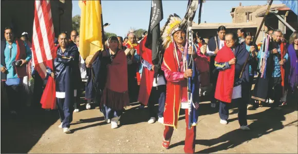  ?? PHOTO BY RICK ROMANCITO ?? ‘The Return of Blue Lake to Taos Pueblo’ celebratio­n in 2010 began with a traditiona­l procession.