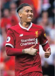  ??  ?? ROBERTO FIRMINO: Celebrates the Reds’ opener.