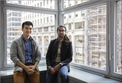  ?? PHOTOS BY CALLA KESSLER — THE NEW YORK TIMES ?? Bryan Dai, left, and Rahul Mahida are co-founders of Daivergent, a start-up that connects technology companies with a pool of candidates on the autism spectrum. The company already has 20 corporate clients and has helped 75 people find work.