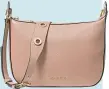  ??  ?? Cream cross body bag was £270, now £108, michaelkor­s.co.uk