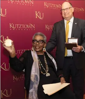  ?? COURTESY OF KUTZTOWN UNIVERSITY ?? Kutztown University’s first Black graduate, Bessie Reese Crenshaw, with Dr. Kenneth Hawkinson, KU president, at a ceremony to award Reese Crenshaw with the Kutztown University President’s Medal.