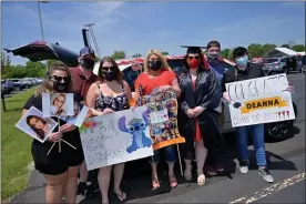  ?? PHOTO BY DAVID DEBALKO ?? Families celebrated the graduation of their loved ones during three drive-in ceremonies May 20at Montgomery County Community College’s Blue Bell Campus.