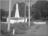  ?? Arkansas Democrat-Gazette/MITCHEL PE MASILUN ?? The FAA’s radio navigation sturcture is in a large field surrounded by Little Rock Port property.