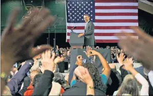  ?? By Pablo Martinez Monsivais, AP ?? Windfall in March: President Obama greets supporters March 30 at a fundraiser at the University of Vermont in Burlington. More than 567,000 people contribute­d to the campaign last month.