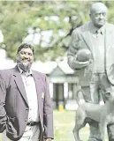  ?? Picture: Supplied ?? LOSS. Prof Mohammad Karaan at a statue of Doc Danie Craven in Stellenbos­ch.