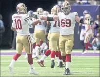  ?? JIM MONE — THE ASSOCIATED PRESS ?? Jimmy Garoppolo, Mike McGlinchey and the 49ers offense were just 1-for-4in converting trips to the red zone into touchdowns.