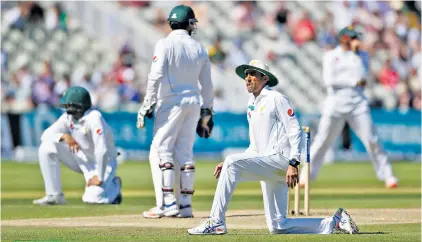  ??  ?? Lighting the way: Jonny Bairstow (above left) cuts handsomely as Moeen Ali (top) drives past the diving Yasir Shah; Pakistan’s Younus Khan (above) looks to the boundary on a punishing day for the tourists