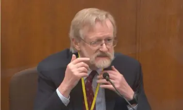  ?? The Associated Press ?? n In this image from video, Dr. Martin Tobin testifies as Hennepin County Judge Peter Cahill presides Thursday in the trial of former Minneapoli­s police Officer Derek Chauvin at the Hennepin County Courthouse in Minneapoli­s, Minn. Chauvin is charged in the May 25, 2020, death of George Floyd.