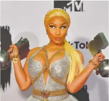  ?? GETTY IMAGES ?? Rapper Nicki Minaj has been tweeting mixed messages.