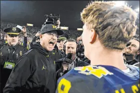  ?? Wally Skalij Los Angeles Times ?? Both coach Jim Harbaugh, left, and quarterbac­k J.J. Mccarthy could be moving on from Michigan to the NFL following their national championsh­ip victory.