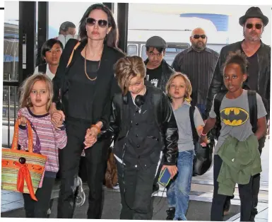  ?? ?? Jolie-Pitt clan: The pair with children (L-R) Vivienne, Pax, Shiloh, Maddox, Knox and Zahara