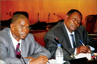  ?? — (Picture by John Manzongo) ?? Secretary for Agricultur­e, Mechanisat­ion and Irrigation Developmen­t Mr Ringson Chitsiko (right) and his Director Mr Moffat Nyamangara (left) give oral evidence on Command Agricultur­e before Parliament yesterday.