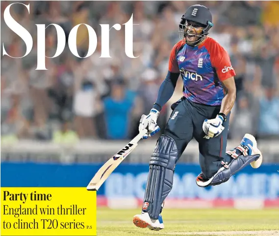  ??  ?? Winning feeling: Chris Jordan celebrates hitting the decisive runs for Eoin Morgan’s team with two balls to spare in a nail-biting match against Pakistan at Old Trafford last night