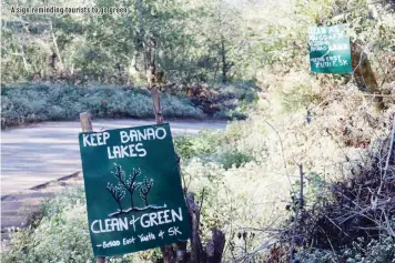  ??  ?? A sign reminding tourists to go green