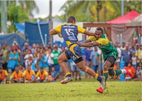  ?? Photo: Leon Lord ?? Northland fullback Saint George Talei fends off a Tailevu tackler during their Skipper Provincial Cup clash at Ratu Cakobau Park (ground 2) on April 17, 2021. Northland won 16-11.