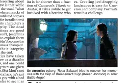  ?? An anesmiac cyborg (Rosa Salazar) tries to recover her memories with the help of street-smart Hugo (Keean Johnson) in Alita: Battle Angel. ??